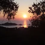 Gecko, Arillas Case de vacanță